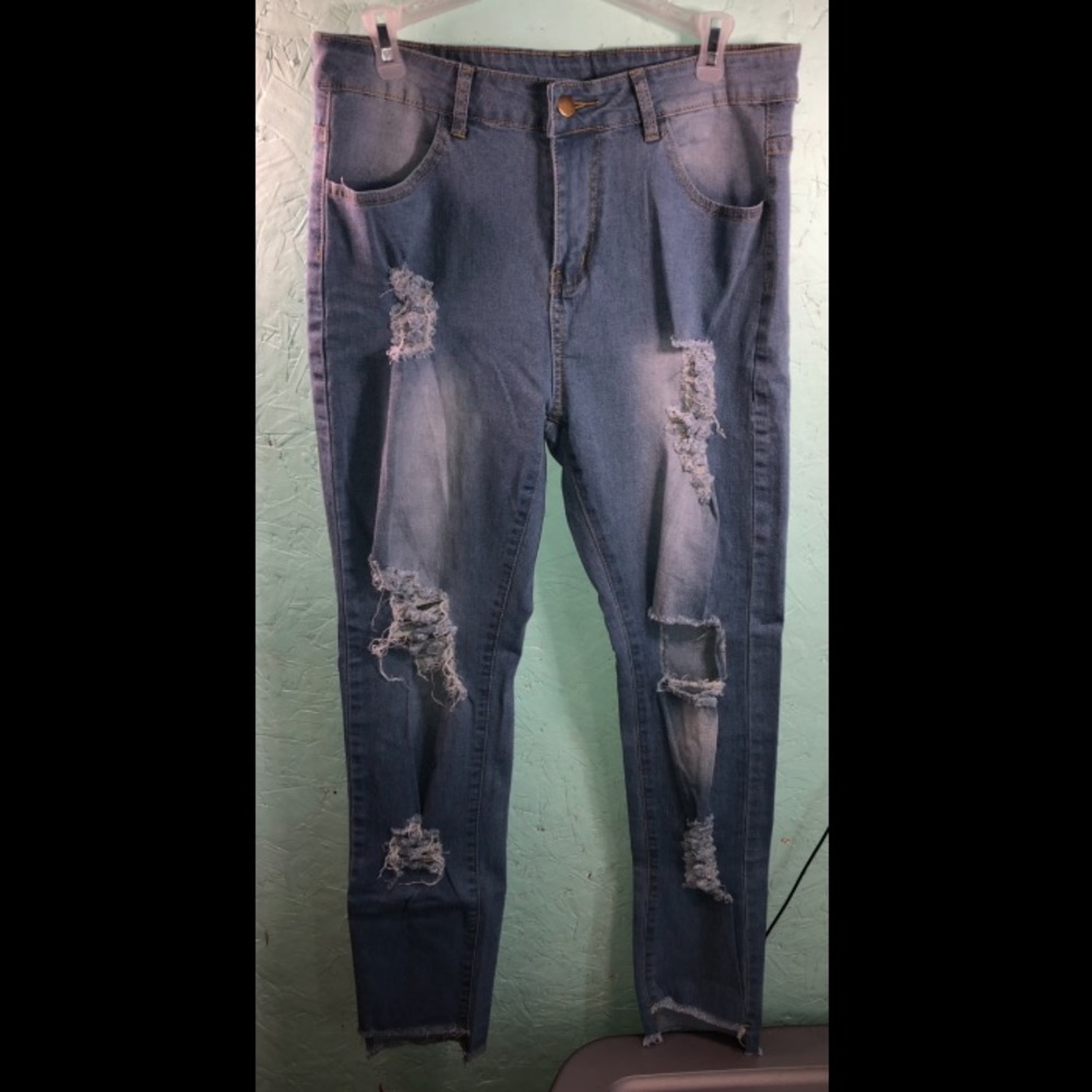 High waisted distressed jeans